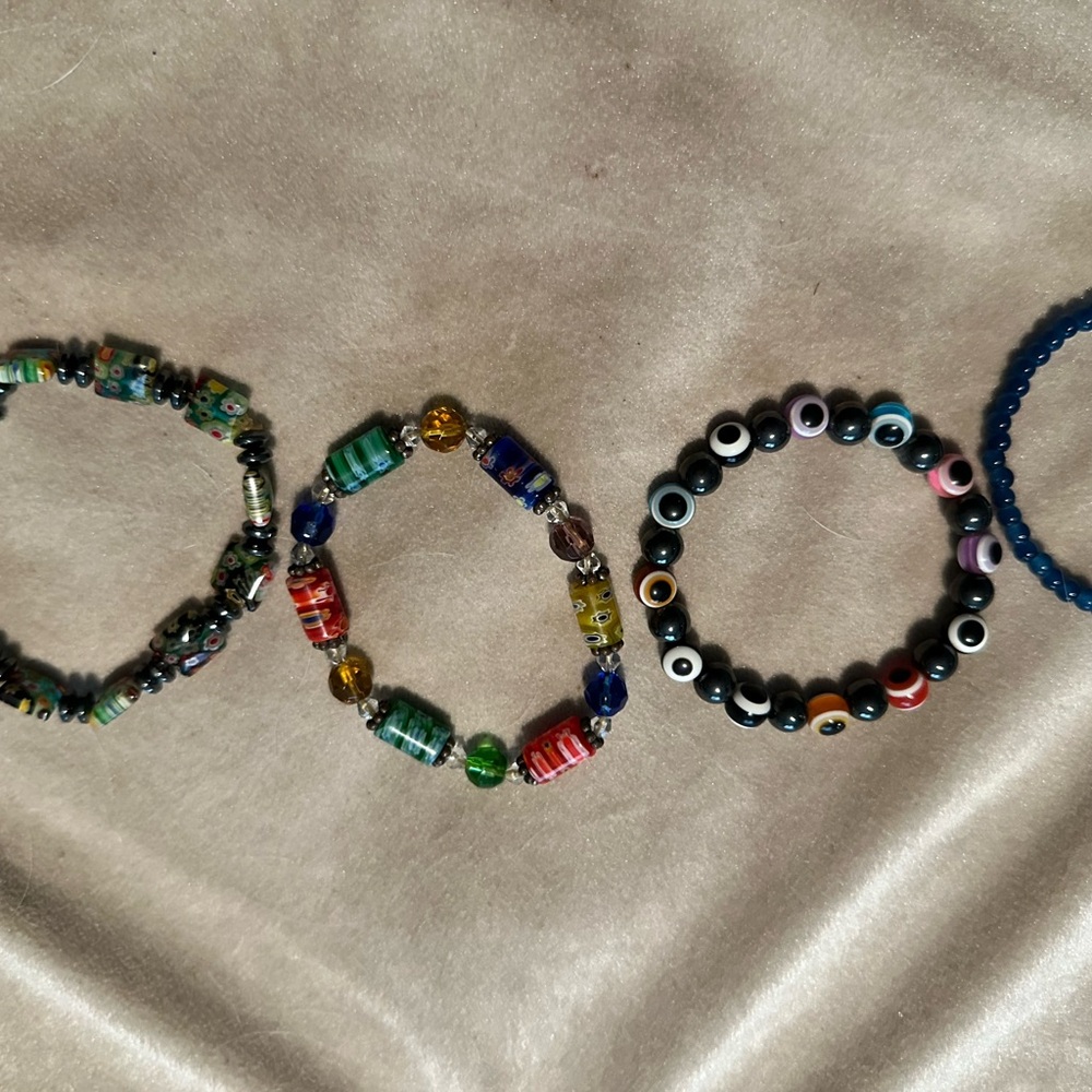 Four Glass Bracelets